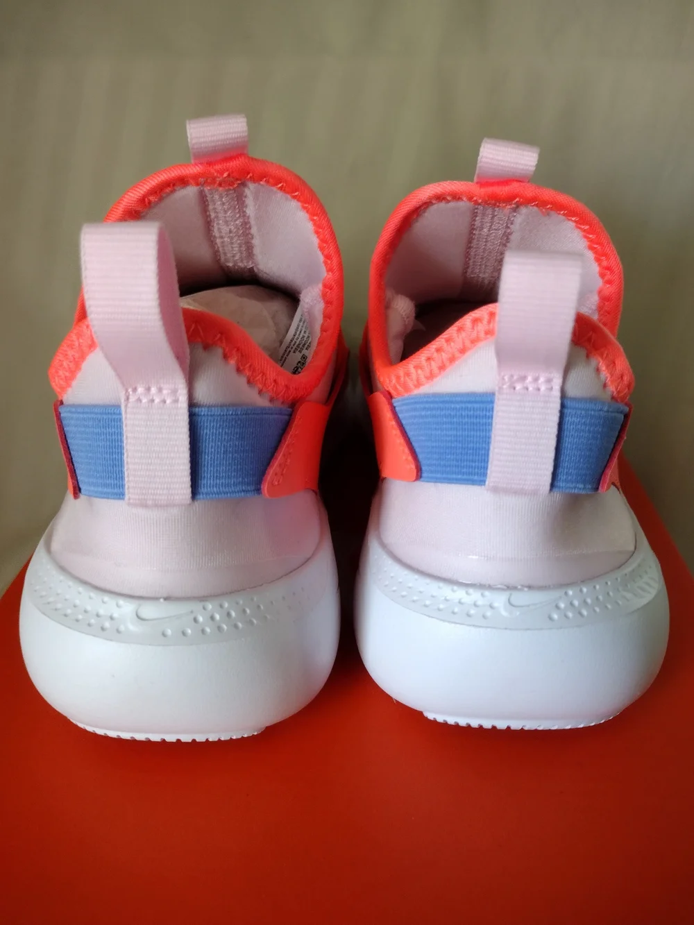 Nike Kids Slip-On Sneakers in White, Coral, Lavender
